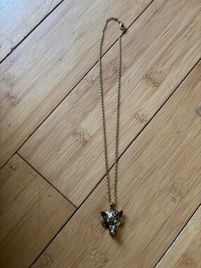Gold tone Wolf Head Pendant Necklace.